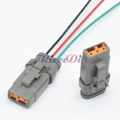 Close-up view of terminals in 3-pin DTM male and female waterproof automotive connector