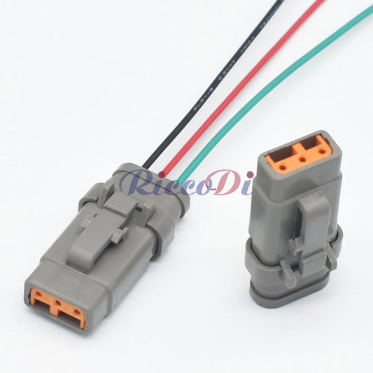 Close-up view of terminals in 3-pin DTM male and female waterproof automotive connector