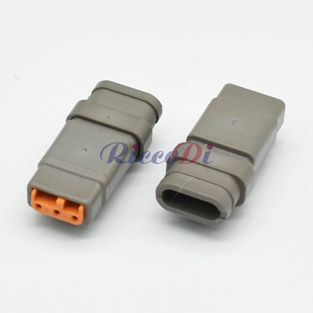 Detailed view of waterproof seal and terminals for secure 3-pin DTM automotive connection
