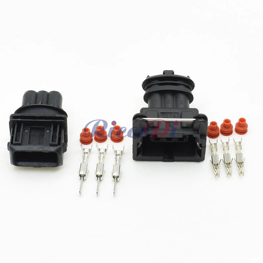 Close-up of 3-pin EFI fuel injector connector 282191-1 282729-1 showing terminals and wire slots