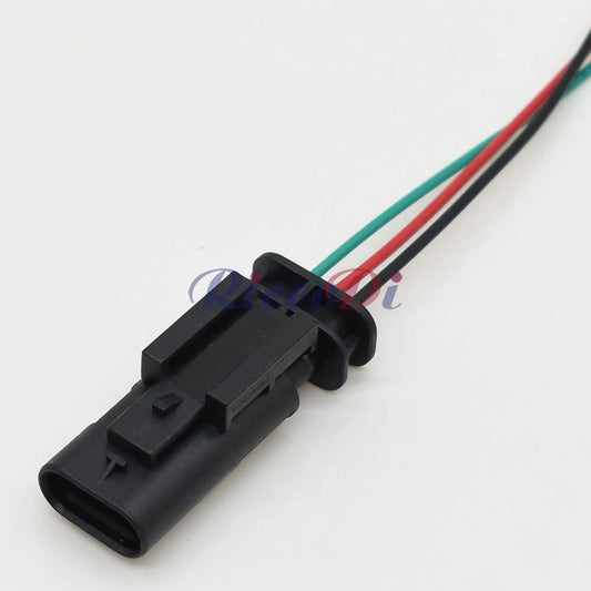 Close-up view of terminals in 3-pin automotive starter connector with male and female plugs