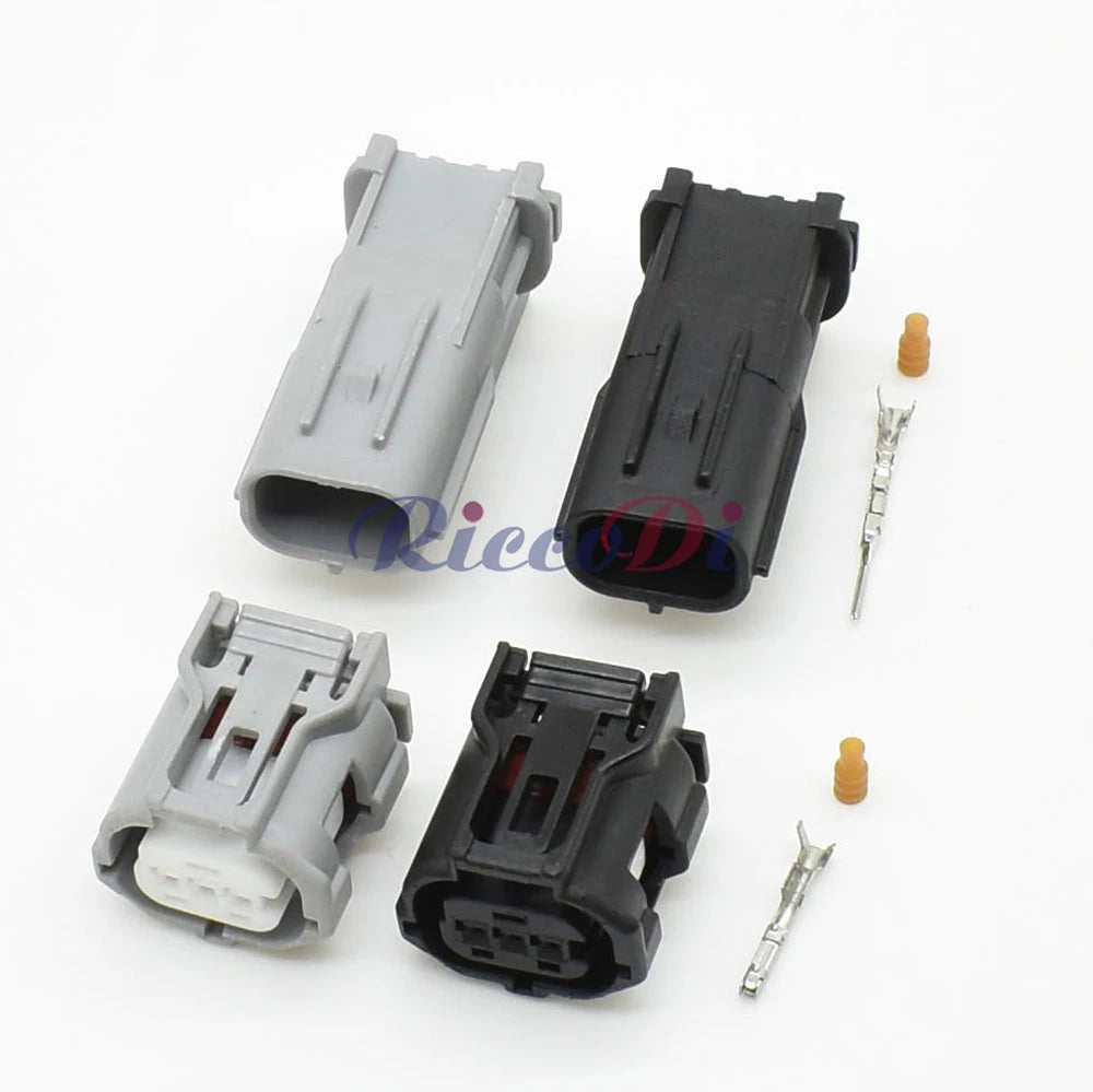 Close-up of 3-pin headlight camshaft sensor plug showing secure male and female terminals for Toyota and Lexus vehicles