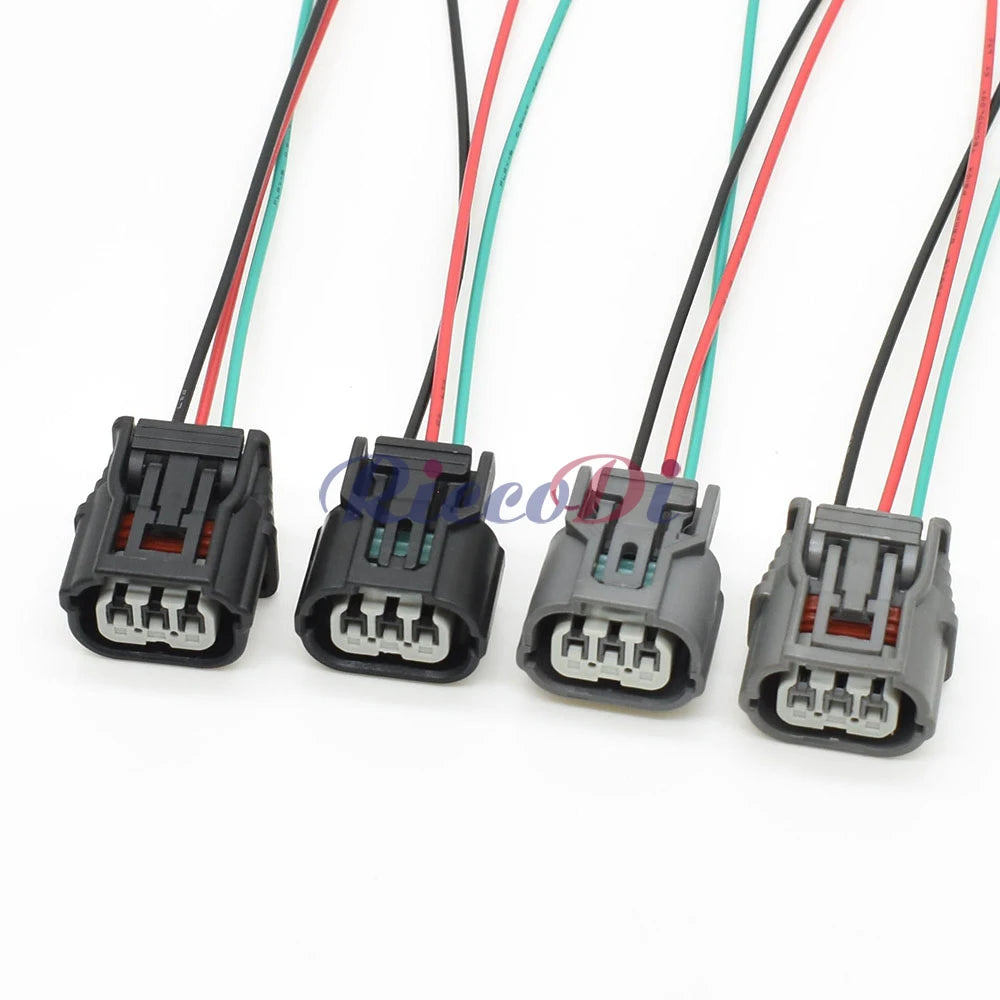3-pin automotive electrical connector 6189-7037 HX 040 installed in vehicle showing secure wire harness connection