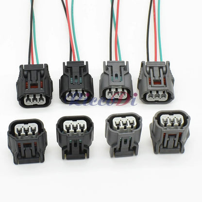 Close-up of 3-pin automotive wire harness connector 6189-7037 HX 040 showing secure terminals