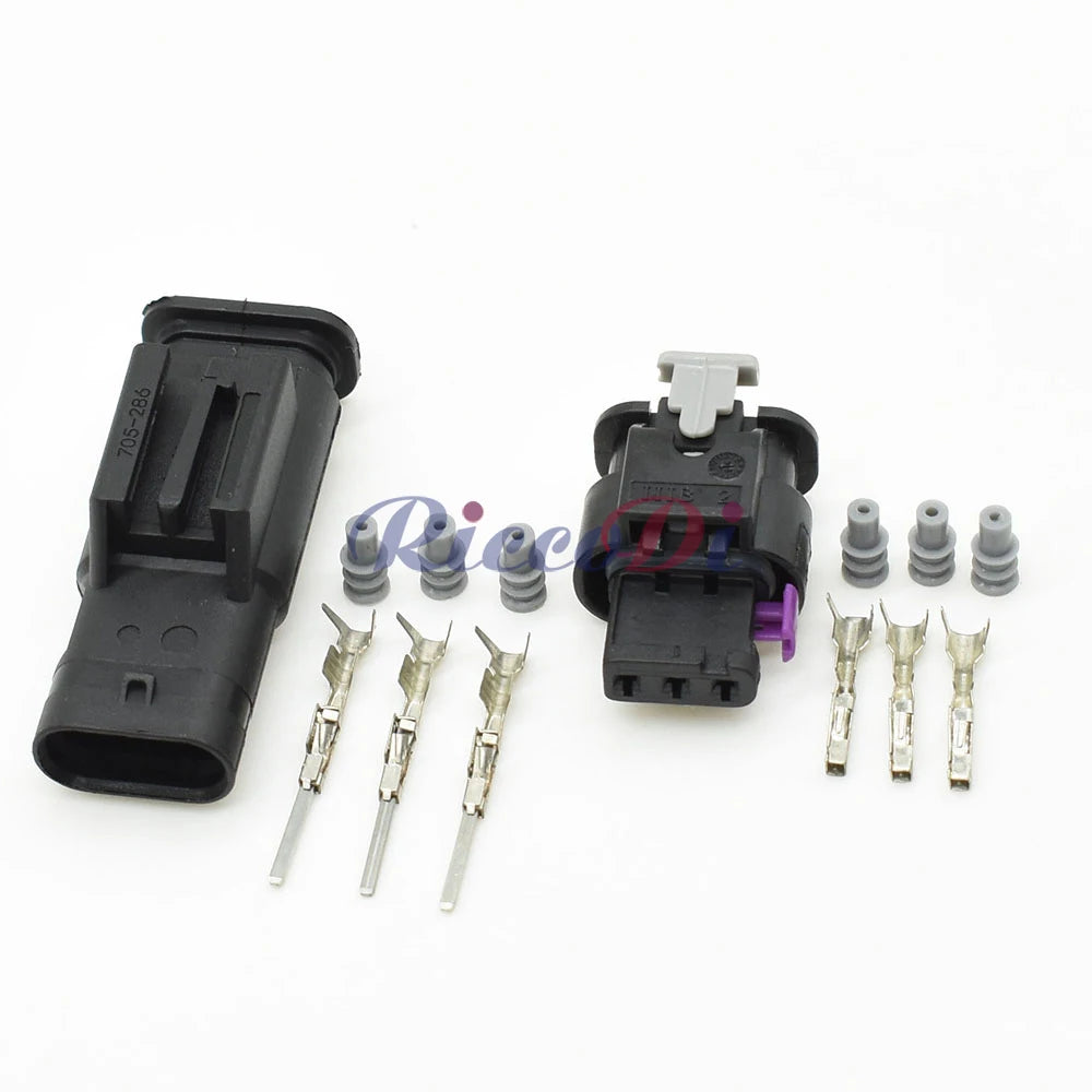 Close-up of 3-pin electronic automotive waterproof connector 1718653-1 4F0973703A 4F0973703 showing terminals