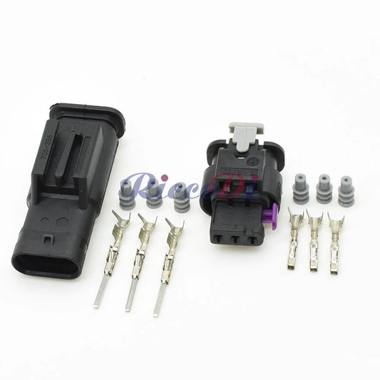Close-up of 3-pin electronic automotive waterproof connector 1718653-1 4F0973703A 4F0973703 showing terminals