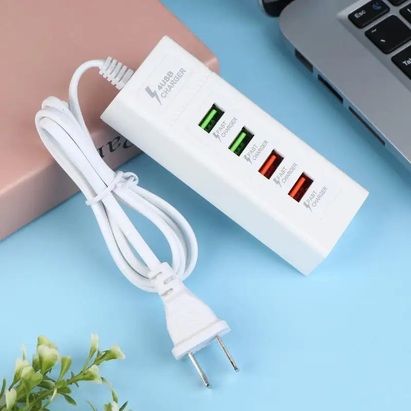 Close-up of 4 ports USB quick charger, portable multi splitter adapter for travel and home use