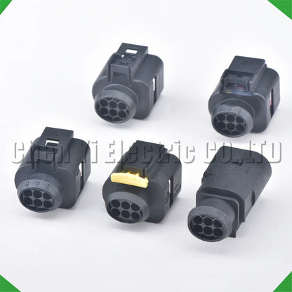 Close-up of 6 pin auto temp sensor connector plug 42121700 for throttle valve and radar systems