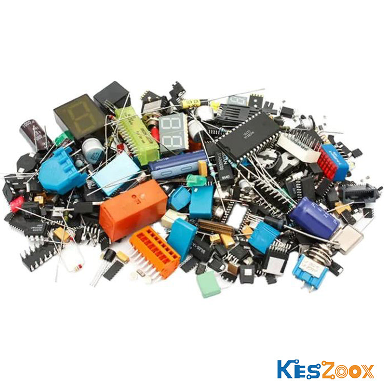 PCB electronic components size comparison top view with millimeter ruler — large QFP IC, SOP IC, SOD diode, SMD tantalum capacitor yellow, SMD aluminum electrolytic capacitor, SMD color-ring resistor, SMD inductor — actual component size reference for PCB layout and assembly at Keszoox