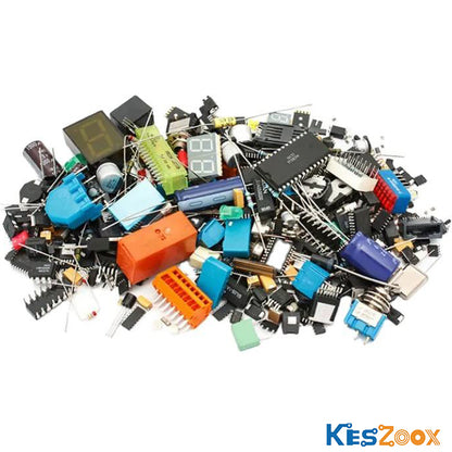 PCB electronic components size comparison top view with millimeter ruler — large QFP IC, SOP IC, SOD diode, SMD tantalum capacitor yellow, SMD aluminum electrolytic capacitor, SMD color-ring resistor, SMD inductor — actual component size reference for PCB layout and assembly at Keszoox