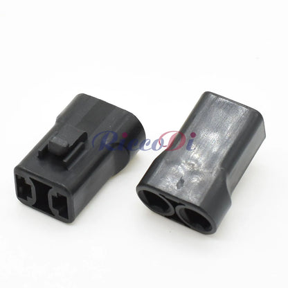 Close-up of terminals on 6.3mm series 2 pin black female connector DJM7021-6.3-21 for secure automotive connections