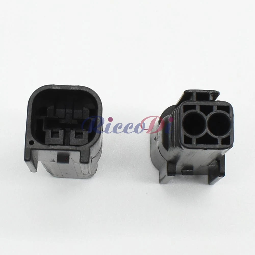 Close-up of 6181-6492 male terminals on waterproof automotive plug connector for reliable wiring performance