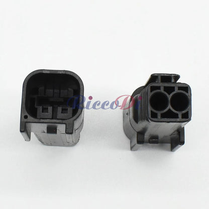 Close-up of 6181-6492 male terminals on waterproof automotive plug connector for reliable wiring performance
