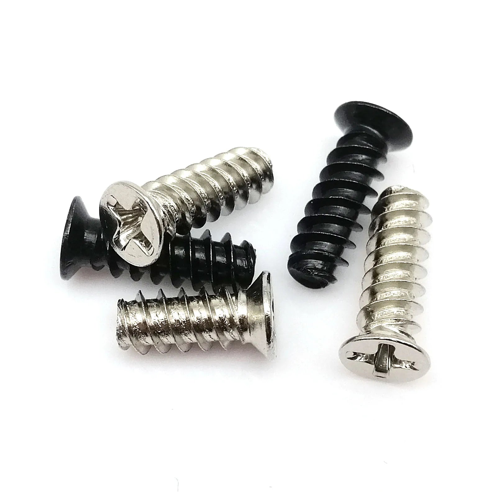 Black_and_silver_Phillips_flat_countersunk_screw_for_PC_case_fan_mounting