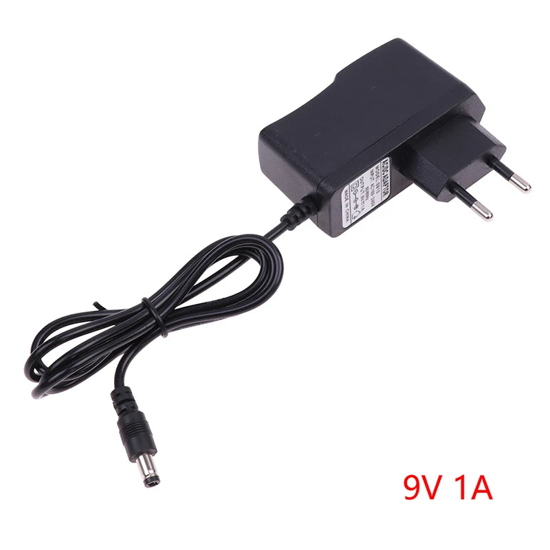 EU Plug 9V 1A Power Adapter AC 100-240V Reverse Polarity Charger Supply