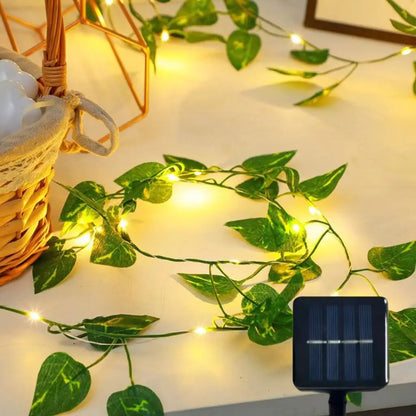 2026 Solar Vine String Lights, 50/100/150 LED Green Fairy Lights with Pothos Leaves for Wedding, Christmas, Home Wall Decor