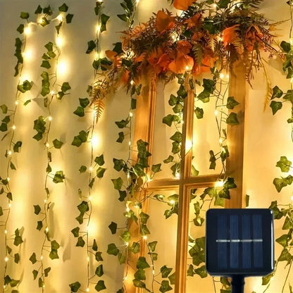 2026 Solar Vine String Lights, 50/100/150 LED Green Fairy Lights with Pothos Leaves for Wedding, Christmas, Home Wall Decor