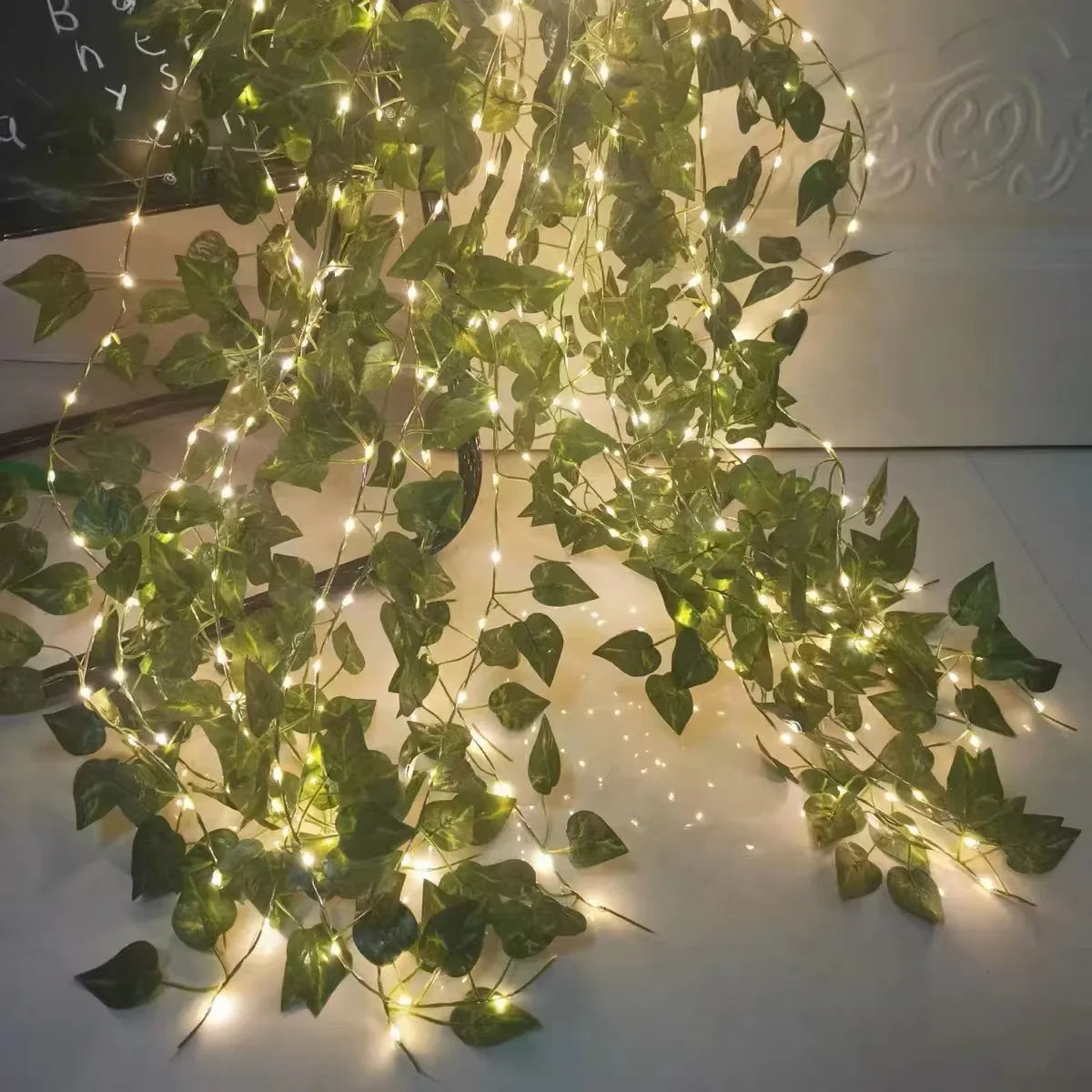 2026 Solar Vine String Lights, 50/100/150 LED Green Fairy Lights with Pothos Leaves for Wedding, Christmas, Home Wall Decor