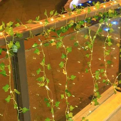 2026 Solar Vine String Lights, 50/100/150 LED Green Fairy Lights with Pothos Leaves for Wedding, Christmas, Home Wall Decor