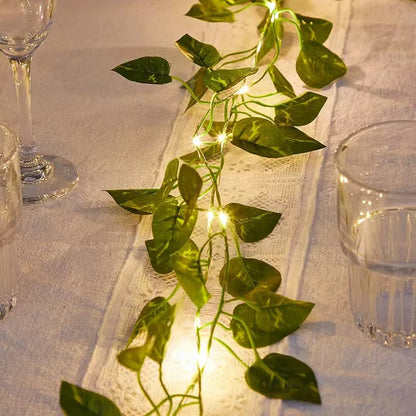 2026 Solar Vine String Lights, 50/100/150 LED Green Fairy Lights with Pothos Leaves for Wedding, Christmas, Home Wall Decor