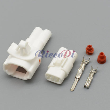 automotive lighting system connector with locking clip for fog lamp wiring