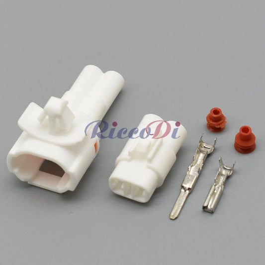 automotive lighting system connector with locking clip for fog lamp wiring