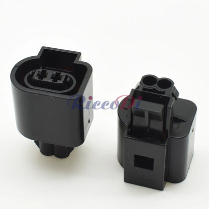 Close-up of 2-pin ABS sensor connector 6N0973702 highlighting secure pins and waterproof housing