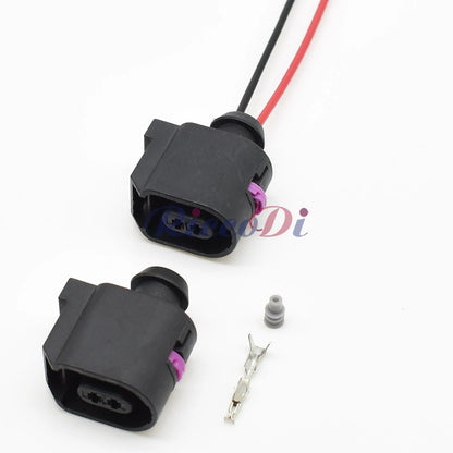detailed view of ABS speed sensor harness plug showing high-quality terminals and robust housing for secure automotive connection