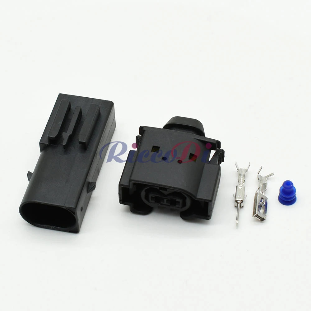 Close-up of terminals on 2-pin AC assembly connector showing secure electrical contact