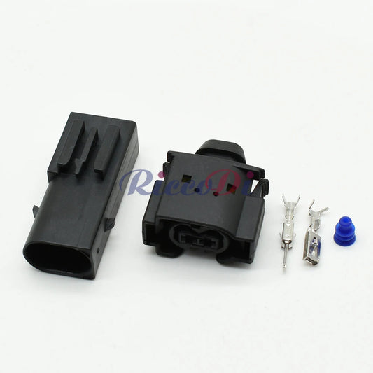 Close-up of terminals on 2-pin AC assembly connector showing secure electrical contact