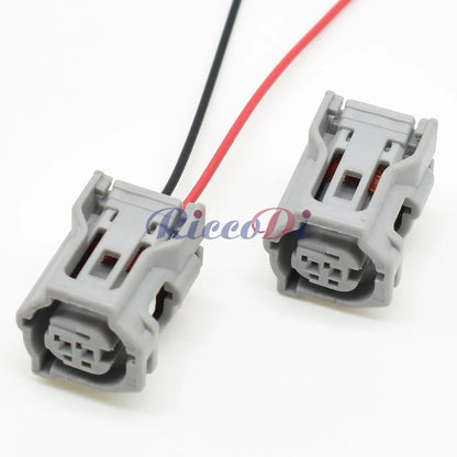 Detailed view of ABS sensor plastic housing on 2-hole AC assembly car wire socket