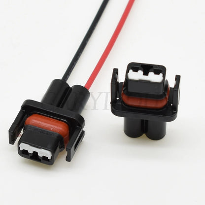 DJ70216Y-1-21 automotive AC solenoid valve connector installed in car showing secure wire harness connection