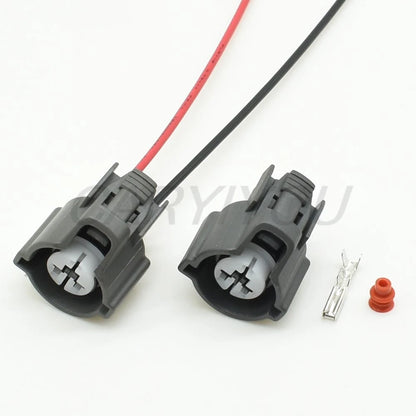 Automotive 2-pin male female wire harness connector DJ70230C installed in vehicle wiring system ensuring safe and stable connections