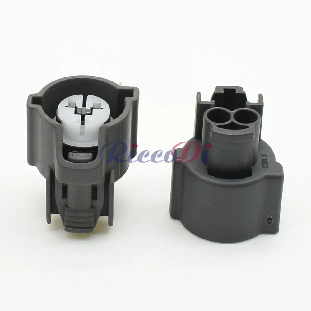 Close-up of male side of 2-pin automotive connector DJ70230C highlighting sealed terminals for reliable connection