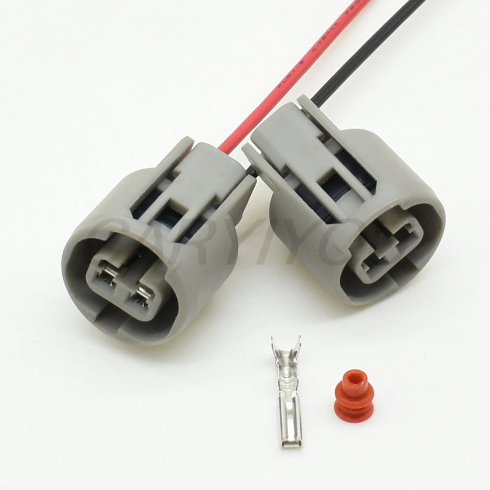 Automotive 2.2mm 2-pin wire harness connector installed in vehicle electrical system for secure connectivity
