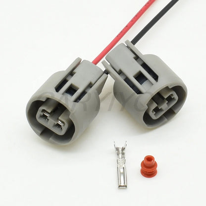 Automotive 2.2mm 2-pin wire harness connector installed in vehicle electrical system for secure connectivity
