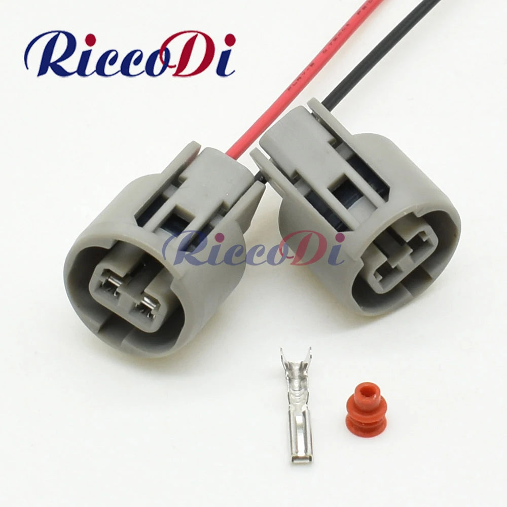 Automotive 2.2mm 2-pin wire harness connector showing complete plug and socket assembly