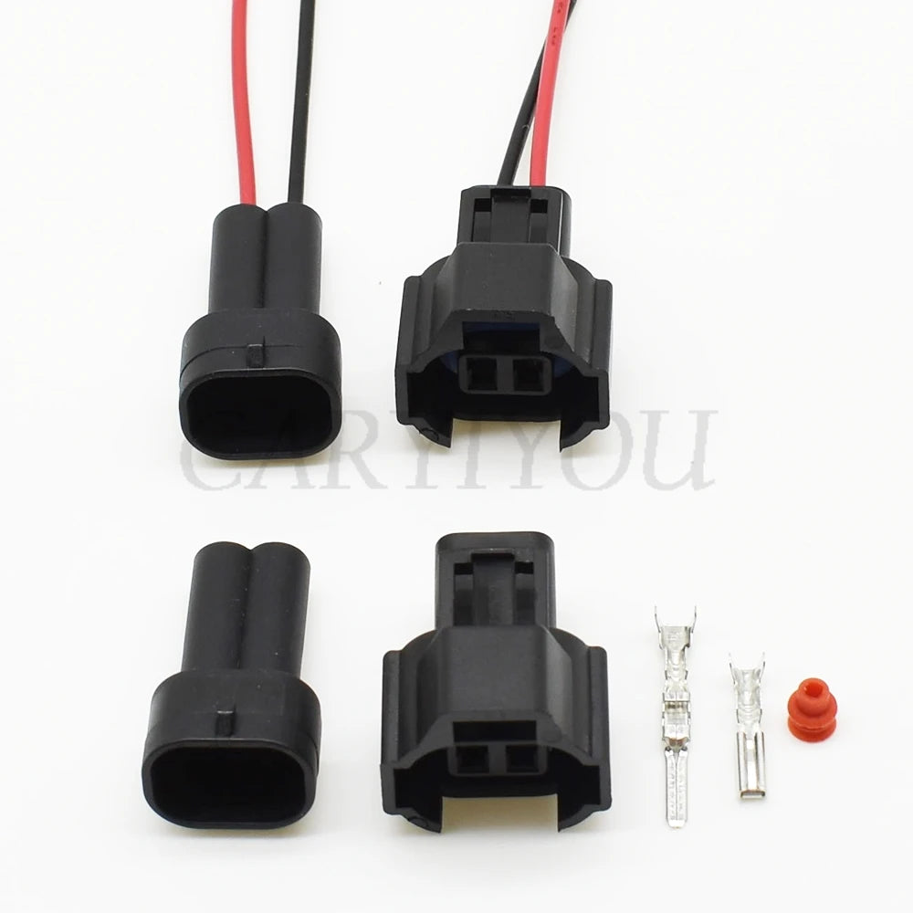 Close-up view of 2-pin automotive male connector with sealed terminals for secure electrical connection