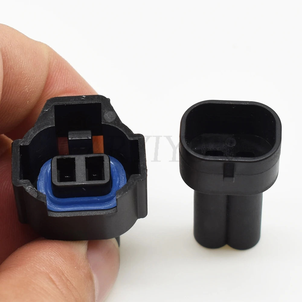 Automotive 2-pin male female wire harness connector installed in vehicle electrical system for safe and stable connections