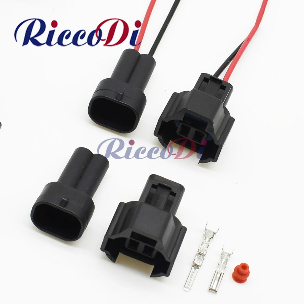 Automotive 2-pin male and female wire harness connector showing full plug and socket assembly