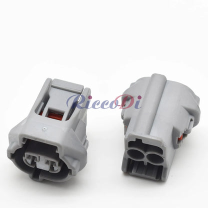 Close-up of 2-pin auto wire harness plug DJ7023YB-2.2-21 showing secure terminals and durable housing