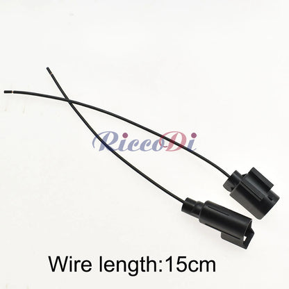 Automotive plastic connector plug being installed in car wiring harness for secure electrical connections