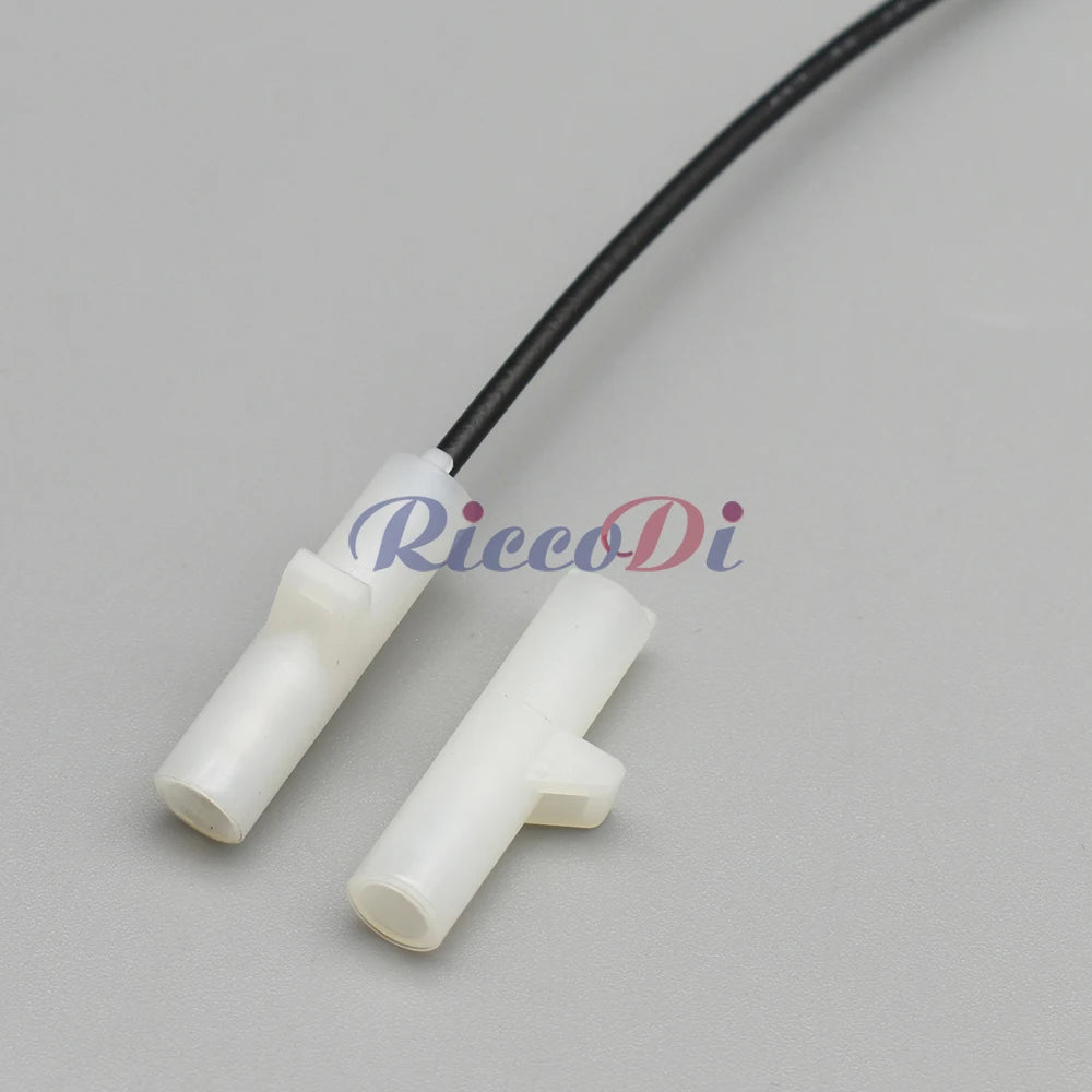 2mm white female automotive connector plug being installed in car wire harness for stable connection