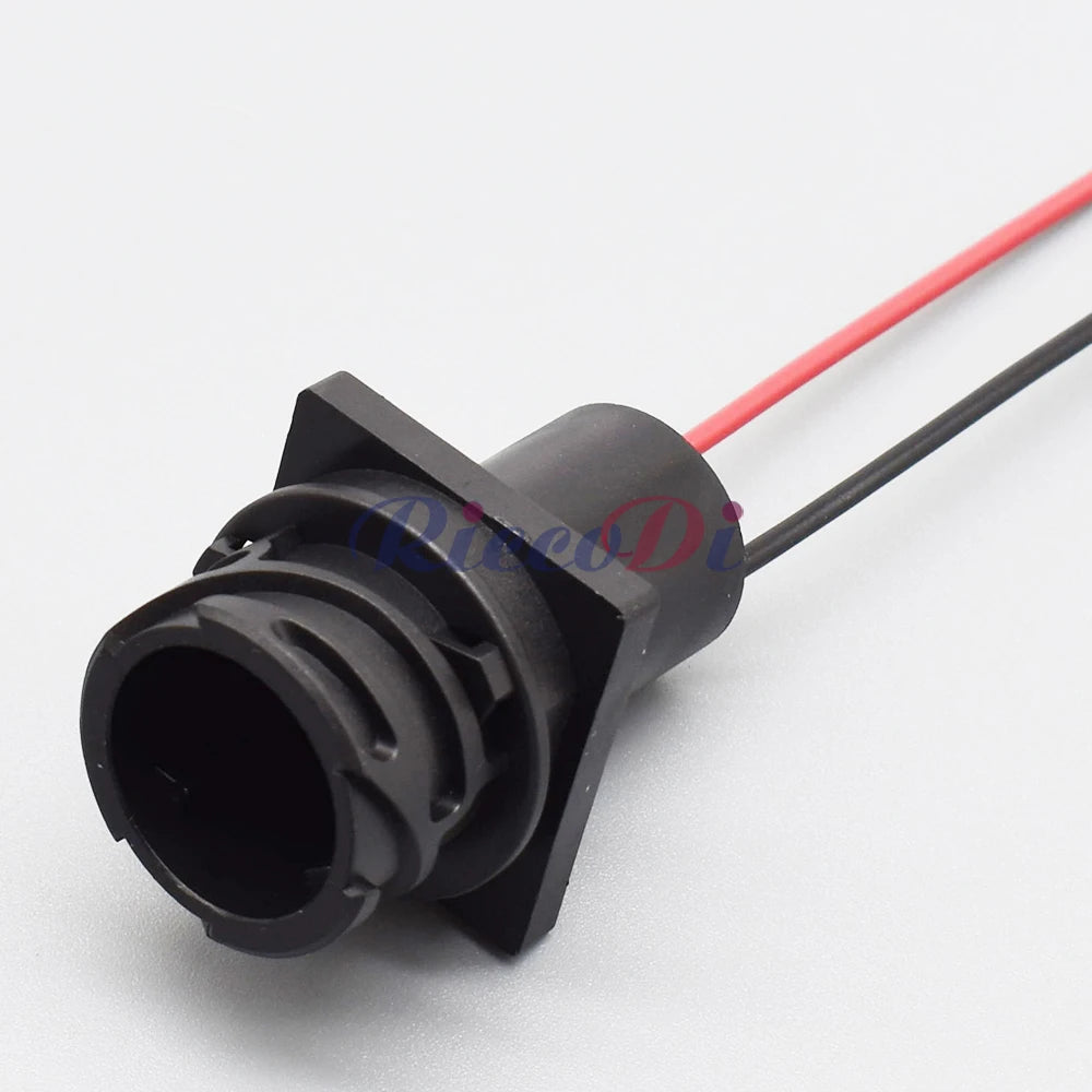 Detailed view of 2.5mm automotive connector plug with secure wiring harness connection