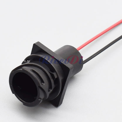 Detailed view of 2.5mm automotive connector plug with secure wiring harness connection