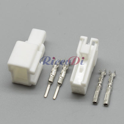 Side view of automotive 2 pin tail lamp plug showing male and female terminals