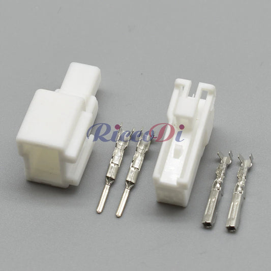 Side view of automotive 2 pin tail lamp plug showing male and female terminals