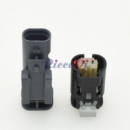 Automotive wire harness connector showing plastic housing and robust construction