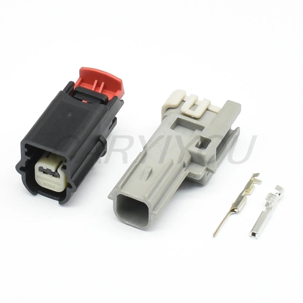 Demonstration of 0.6mm 2-pin connector fitting into vehicle wiring harness for reliable connection