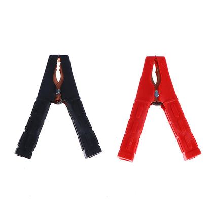 Automotive battery boost clip for emergency starting